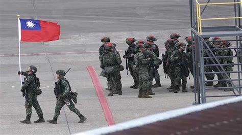 Taiwan says China is bolstering coastline military bases facing the self-ruled island